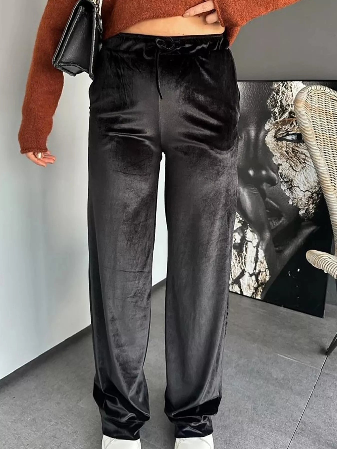 Elegant velvet wide leg pants offering comfort and style for formal occasions.