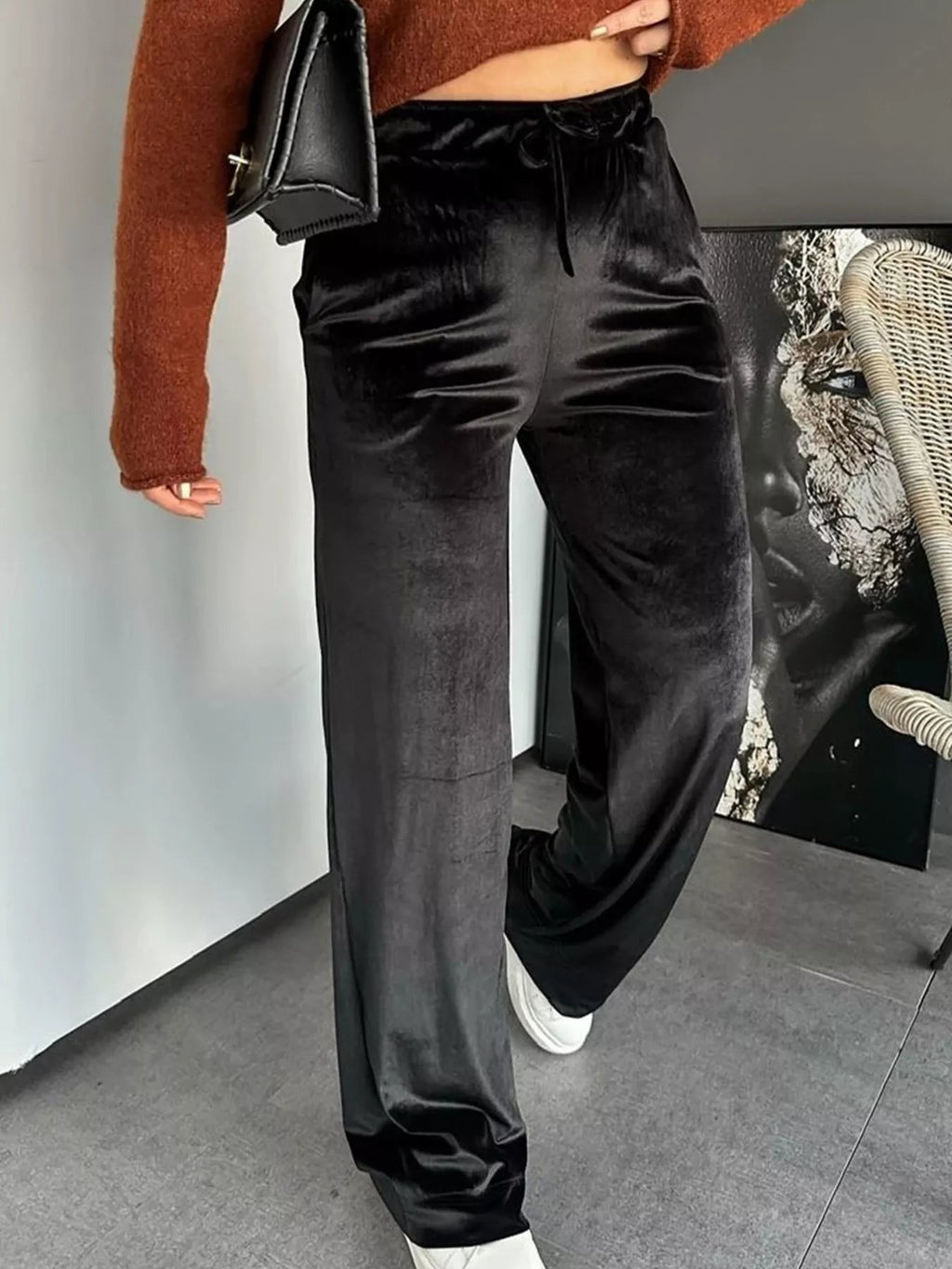 Elegant velvet wide leg pants offering comfort and style for formal occasions.