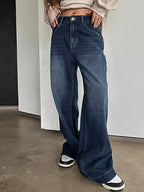 Classic vintage wide leg jeans offering timeless style and comfortable fit for versatile fashion looks.
