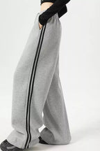 Elegant striped wide leg pants perfect for professional and casual wear, featuring a comfortable and stylish fit.