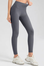 Wide waistband sport leggings providing comfort and support, ideal for active wear and fitness workouts.