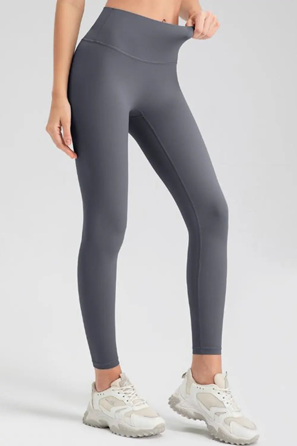 Wide waistband sport leggings providing comfort and support, ideal for active wear and fitness workouts.