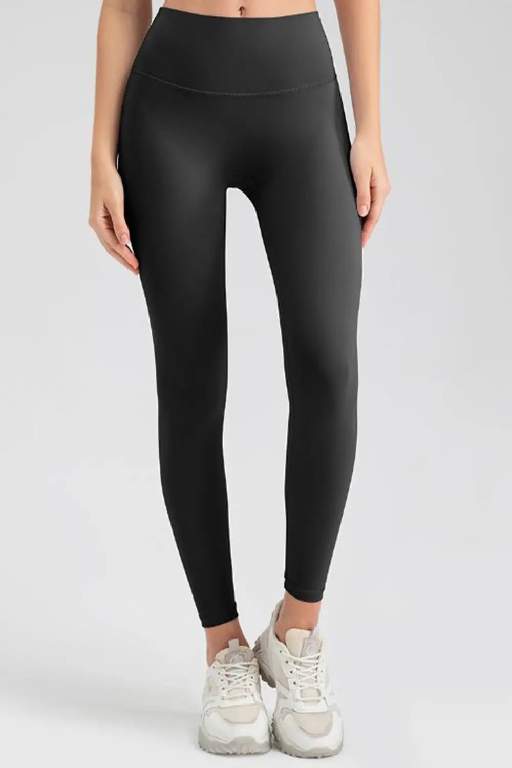 Wide waistband sport leggings providing comfort and support, ideal for active wear and fitness workouts.