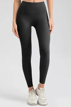 Wide waistband sport leggings providing comfort and support, ideal for active wear and fitness workouts.