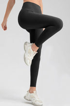 Wide waistband sport leggings providing comfort and support, ideal for active wear and fitness workouts.