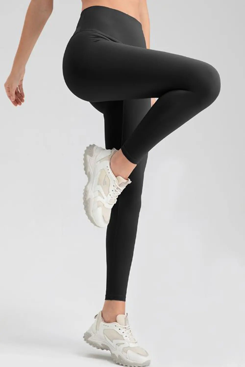 Wide waistband sport leggings providing comfort and support, ideal for active wear and fitness workouts.