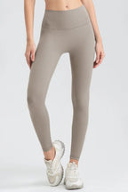 Wide waistband sport leggings providing comfort and support, ideal for active wear and fitness workouts.