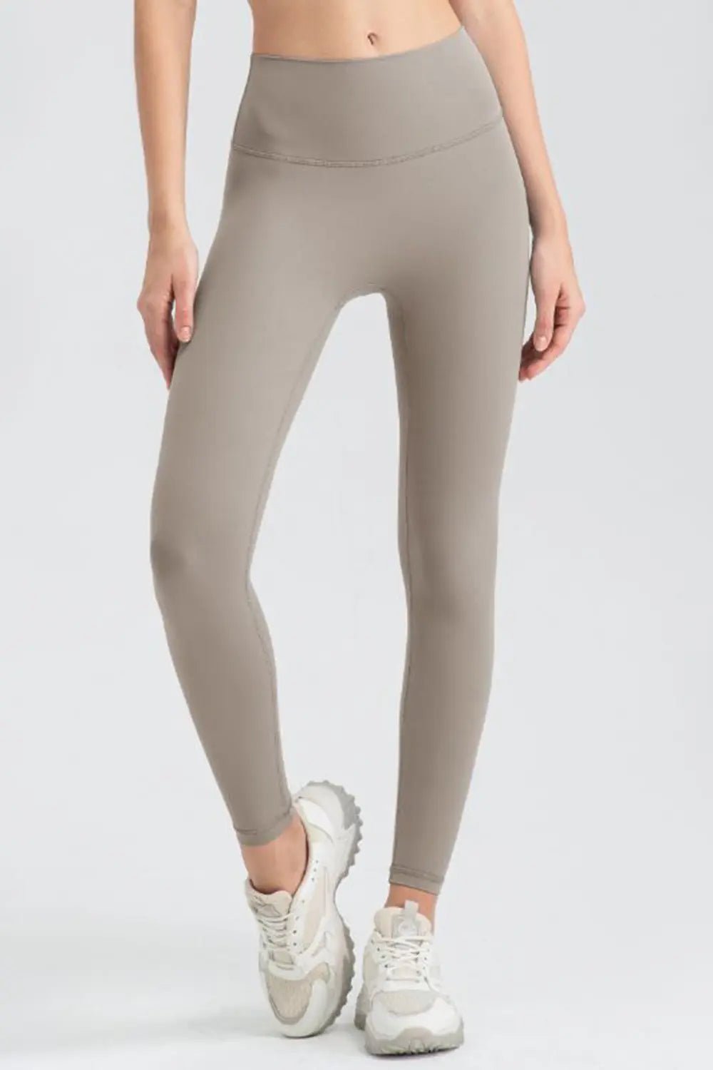 Wide waistband sport leggings providing comfort and support, ideal for active wear and fitness workouts.