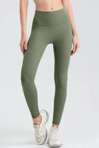 Wide waistband sport leggings providing comfort and support, ideal for active wear and fitness workouts.