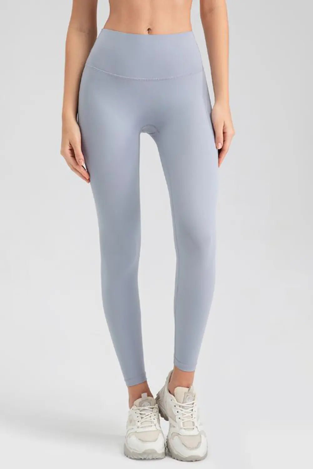 Wide waistband sport leggings providing comfort and support, ideal for active wear and fitness workouts.