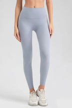 Wide waistband sport leggings providing comfort and support, ideal for active wear and fitness workouts.