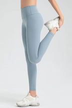 Wide waistband sport leggings providing comfort and support, ideal for active wear and fitness workouts.