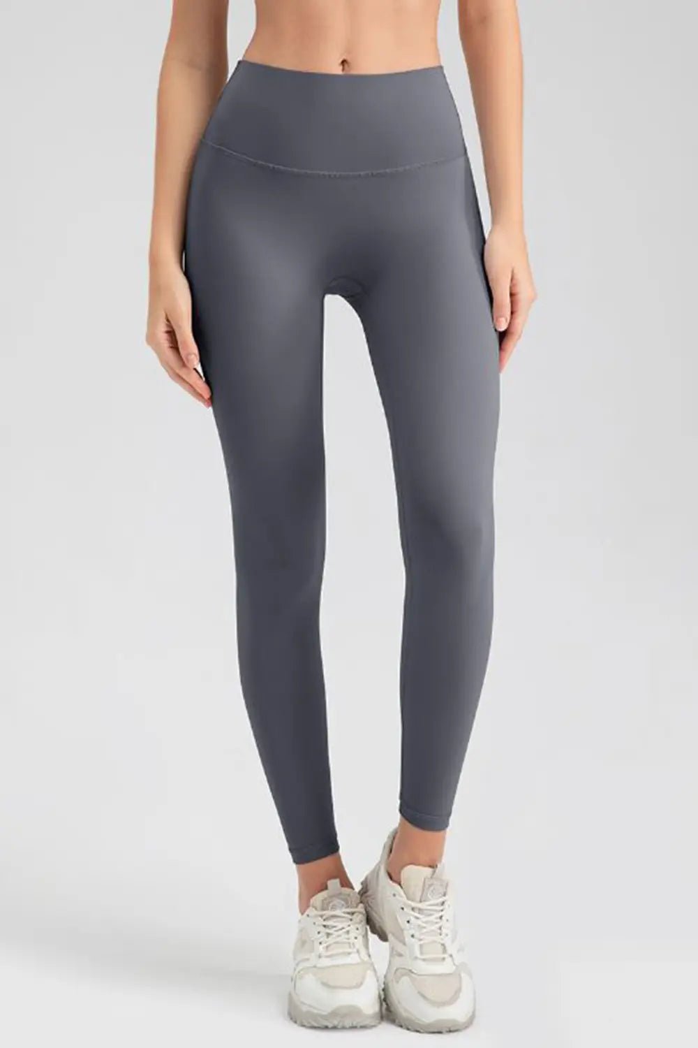Wide waistband sport leggings providing comfort and support, ideal for active wear and fitness workouts.
