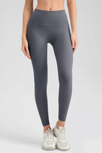 Wide waistband sport leggings providing comfort and support, ideal for active wear and fitness workouts.