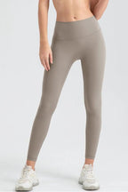 Wide waistband sport leggings providing comfort and support, ideal for active wear and fitness workouts.
