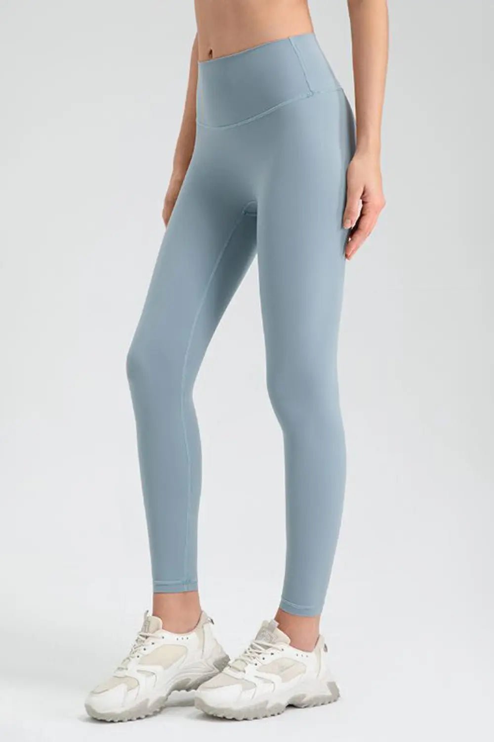 Wide waistband sport leggings providing comfort and support, ideal for active wear and fitness workouts.