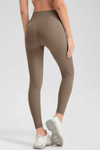 Wide waistband sport leggings providing comfort and support, ideal for active wear and fitness workouts.