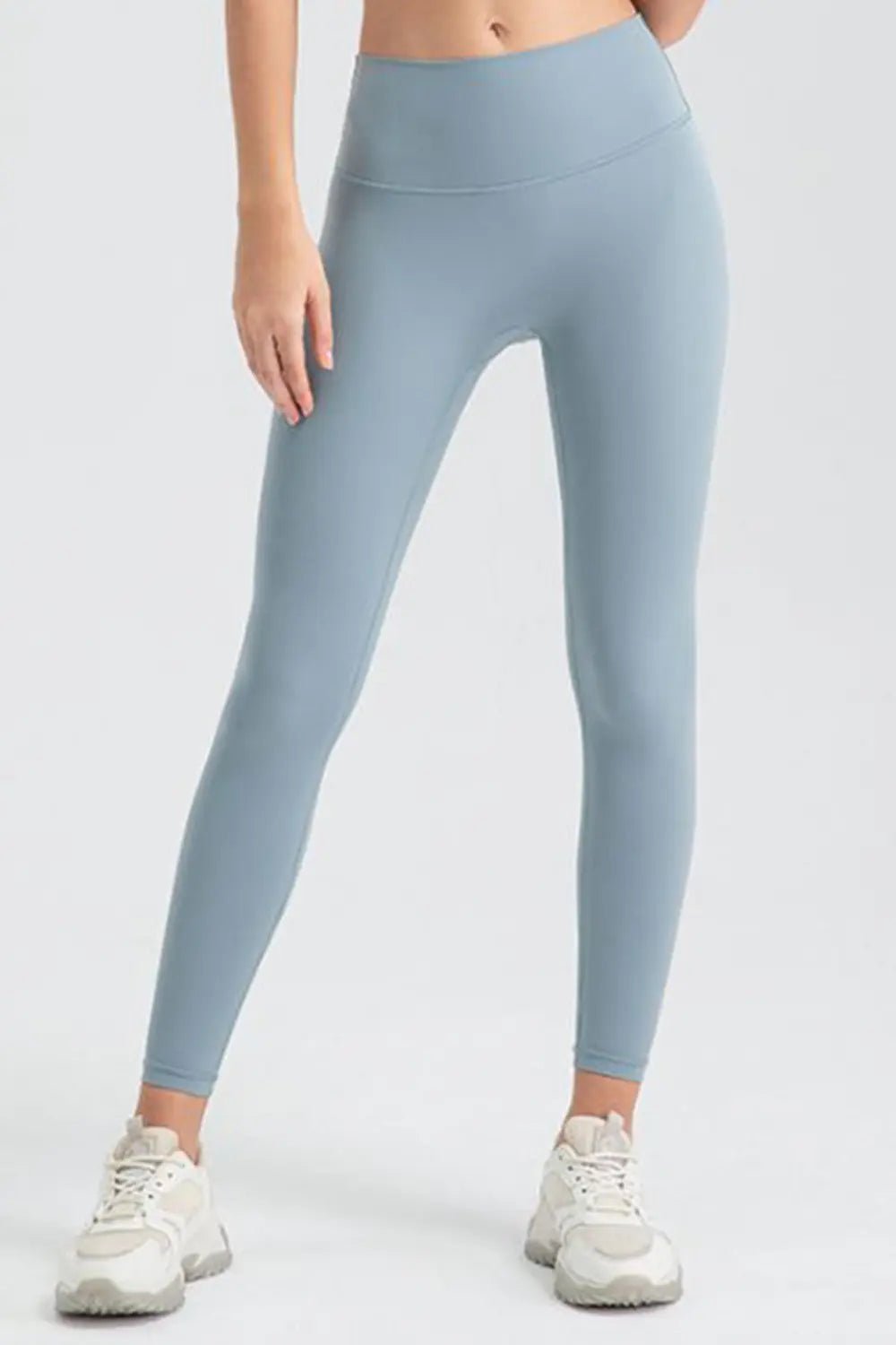 Wide waistband sport leggings providing comfort and support, ideal for active wear and fitness workouts.