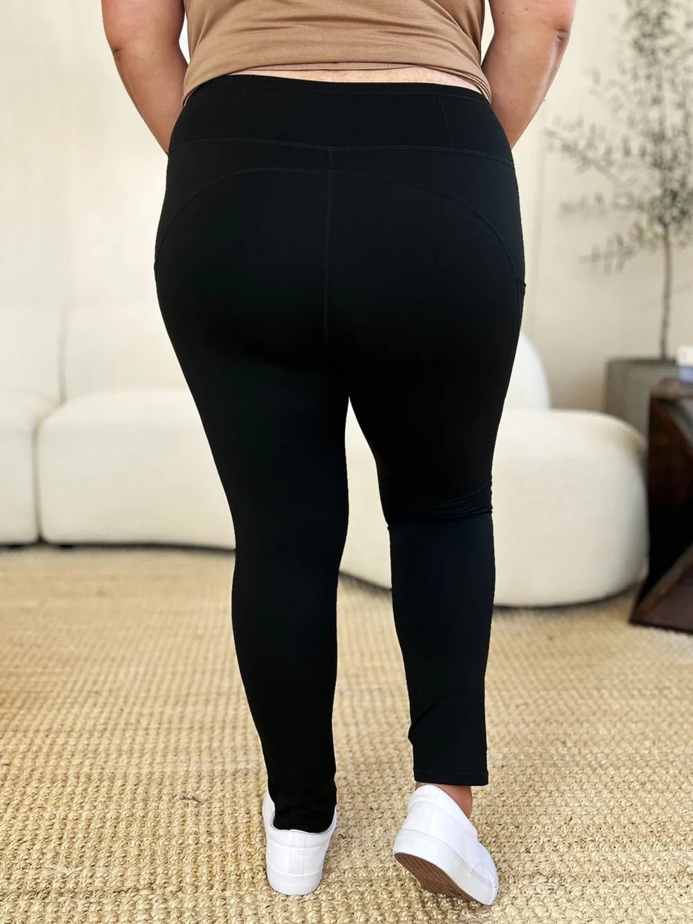 Wide waistband sports leggings provide comfort and support, perfect for active wear and stylish leggings