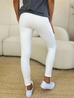 Wide waistband sports leggings provide comfort and support, perfect for active wear and stylish leggings