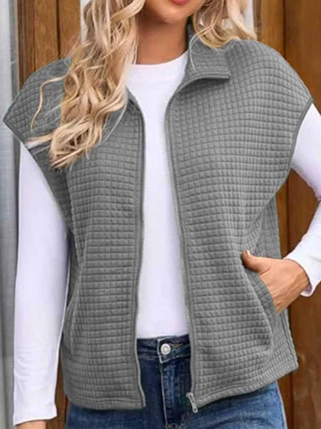Zip-up vest designed for ultimate comfort, enhancing style and layering versatility.