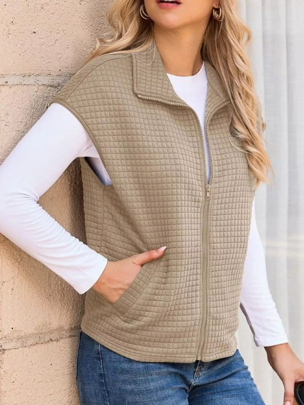 Zip-up vest designed for ultimate comfort, enhancing style and layering versatility.