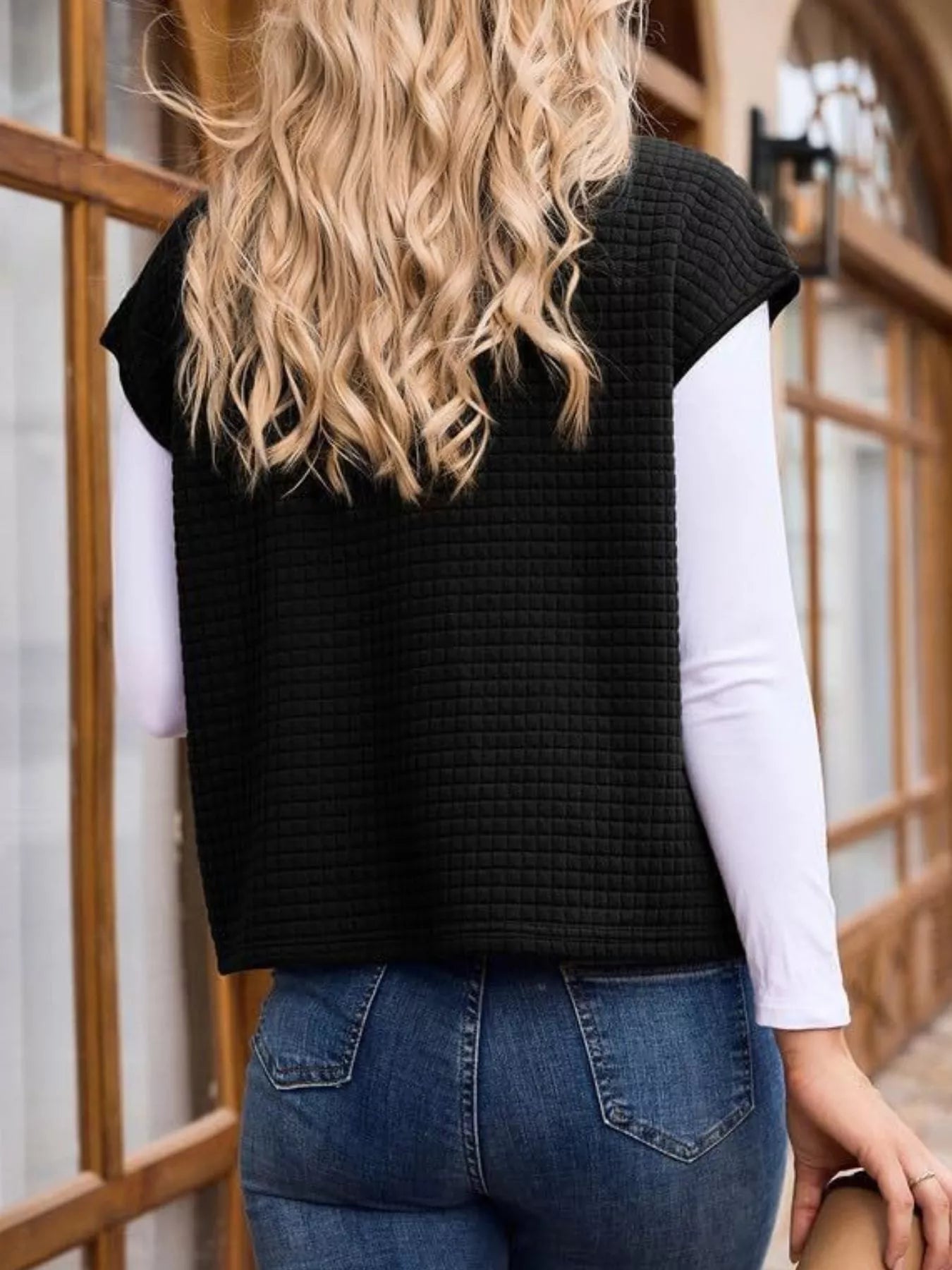 Zip-up vest designed for ultimate comfort, enhancing style and layering versatility.