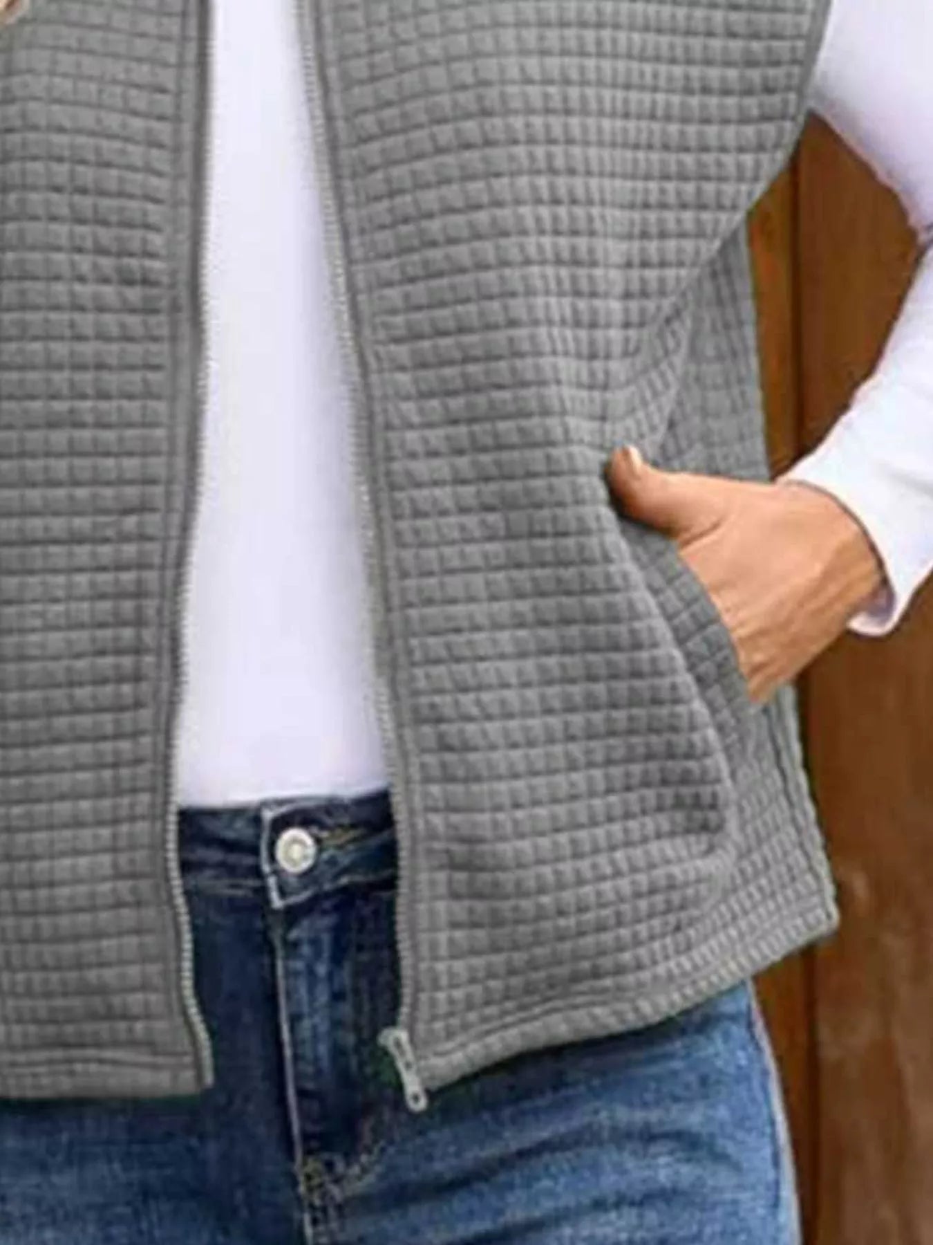 Zip-up vest designed for ultimate comfort, enhancing style and layering versatility.